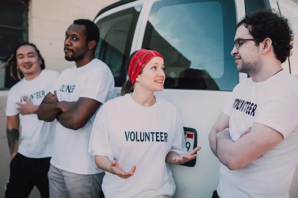 Men and women doing volunteer work