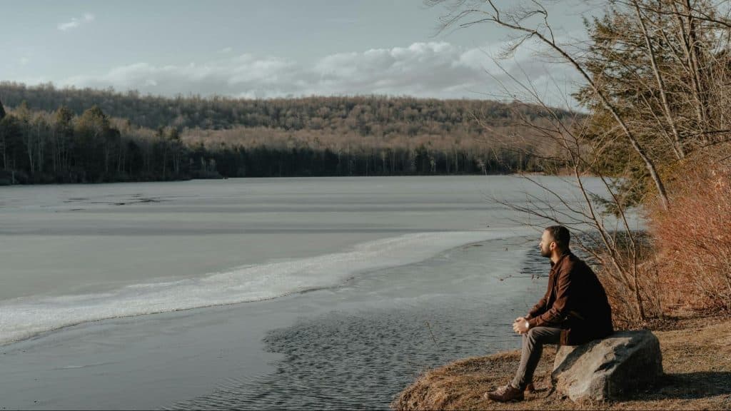 A man sitting on the rock