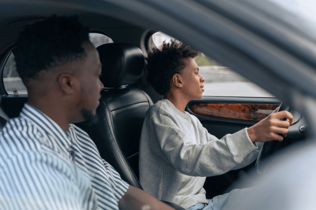 A father and son in a car