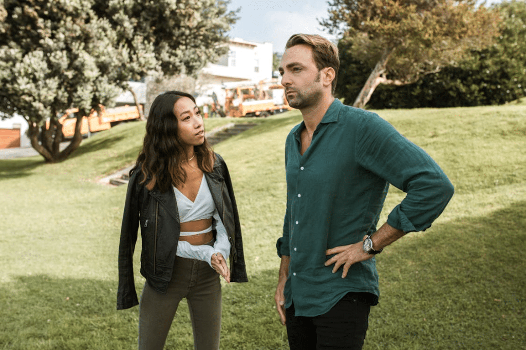 Couple having a misunderstanding outdoors