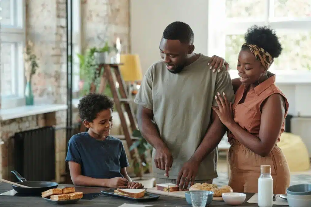 A man and woman at the kitchen