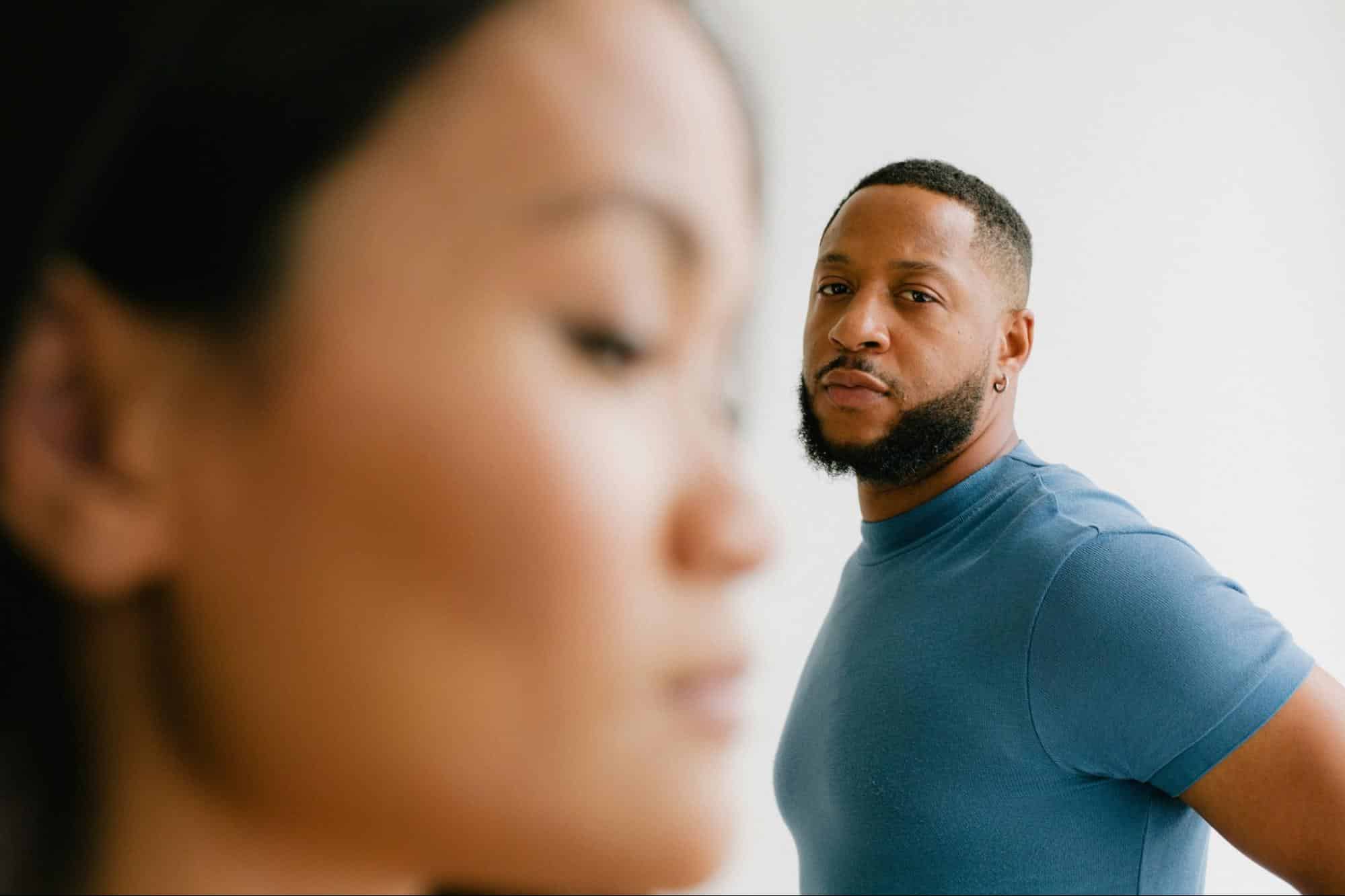 A man looking at the woman