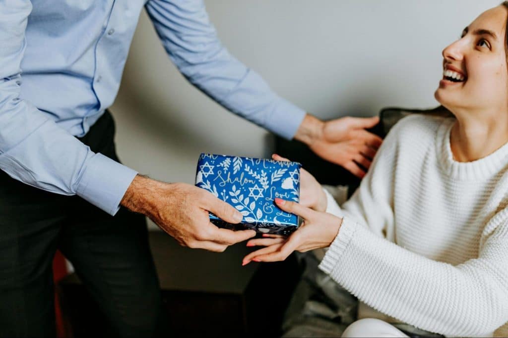 A woman receiving a gift