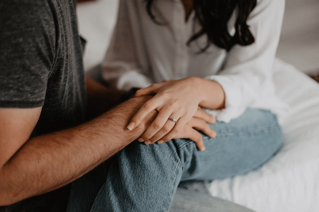 A couple holding each other