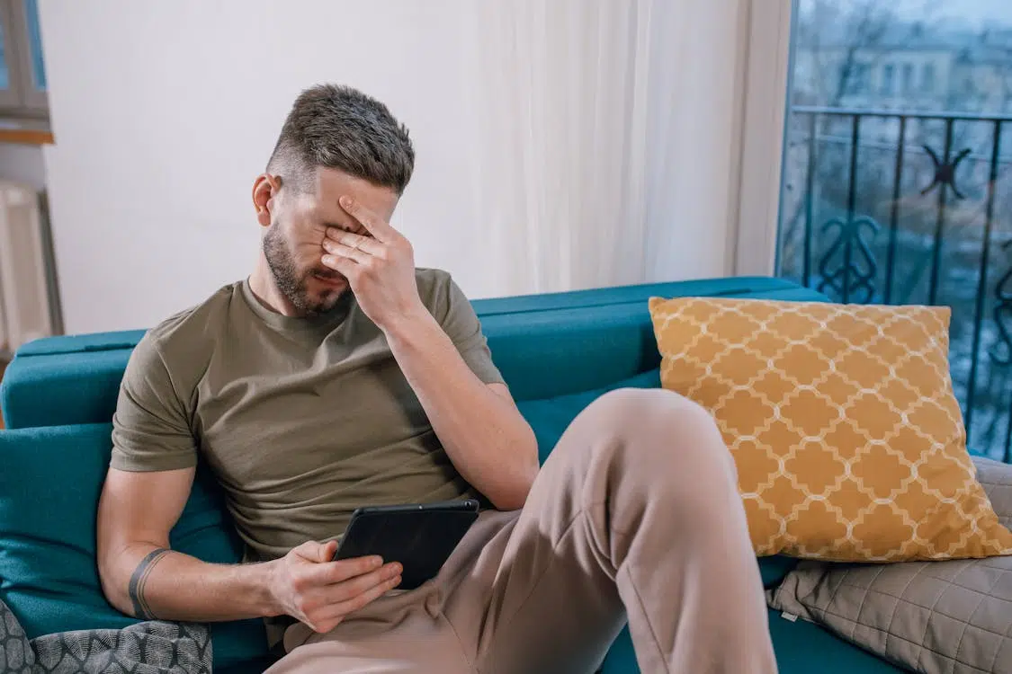 A man looking stressed