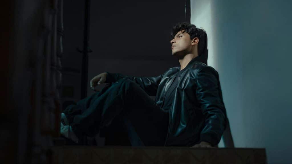 A sad man sitting at the floor