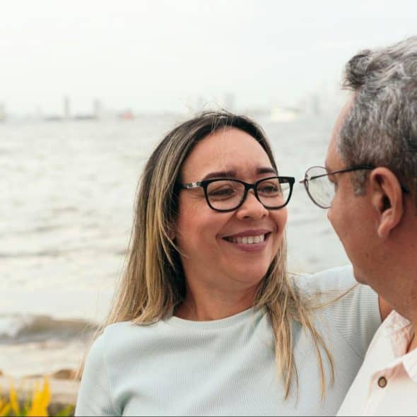 A man and woman looking at each other