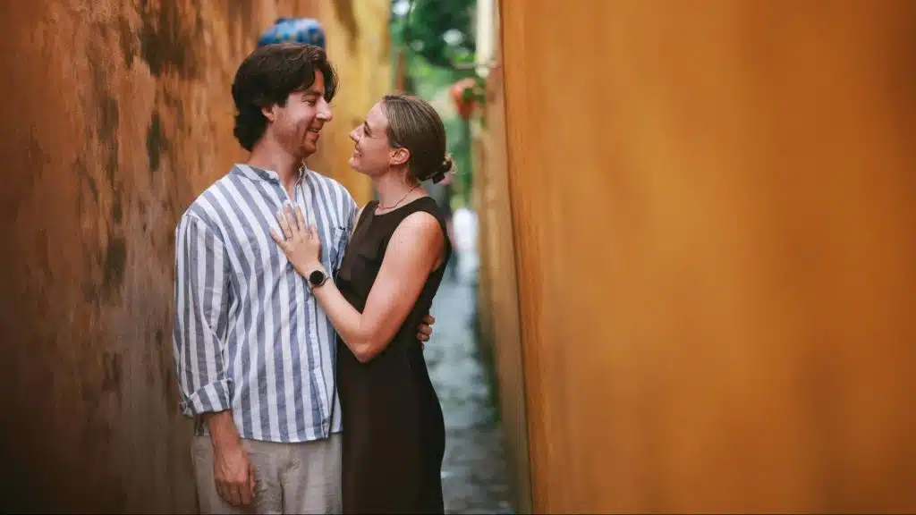 A man and woman looking at each other