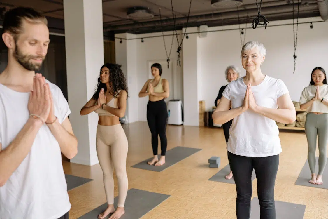 A group of people meditating together