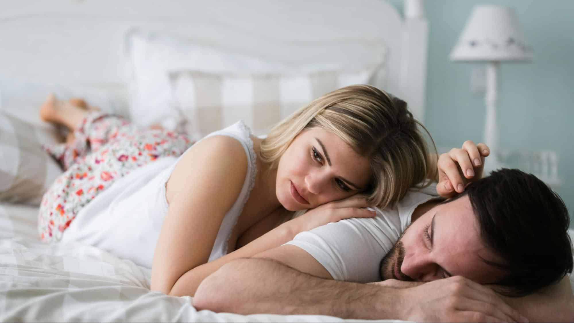 A man pretending to sleep