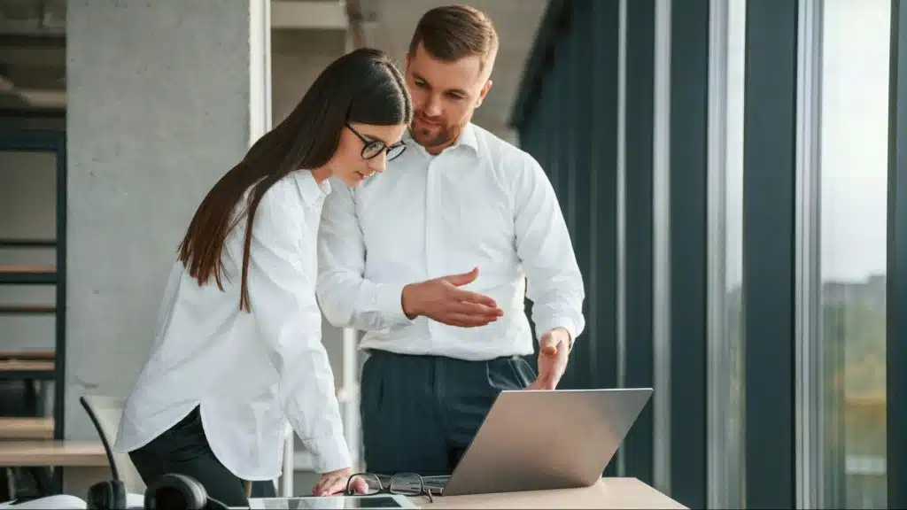 A man and woman having a conversation about their finances