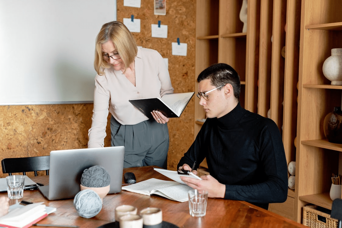A man and a woman in an office