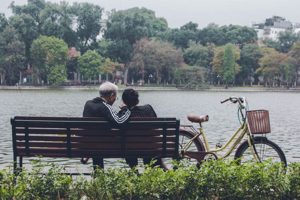 A couple sitting on a bench