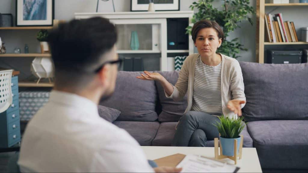 A man and woman at the living room