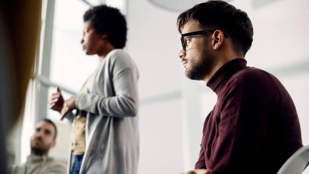 A man listening during a meeting.