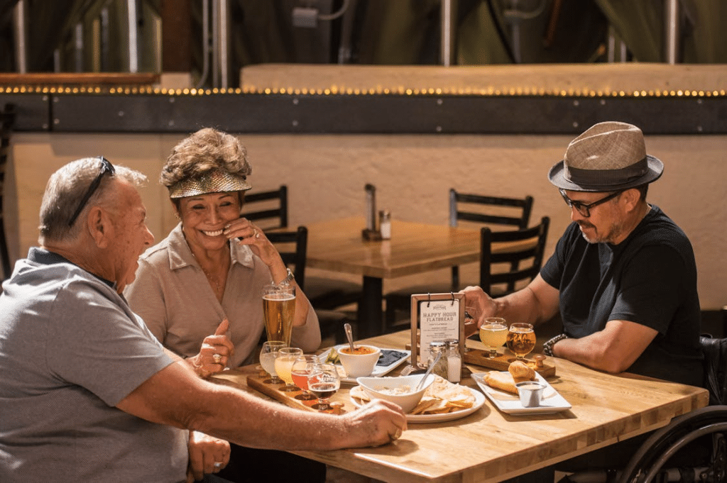 Three people talking 
