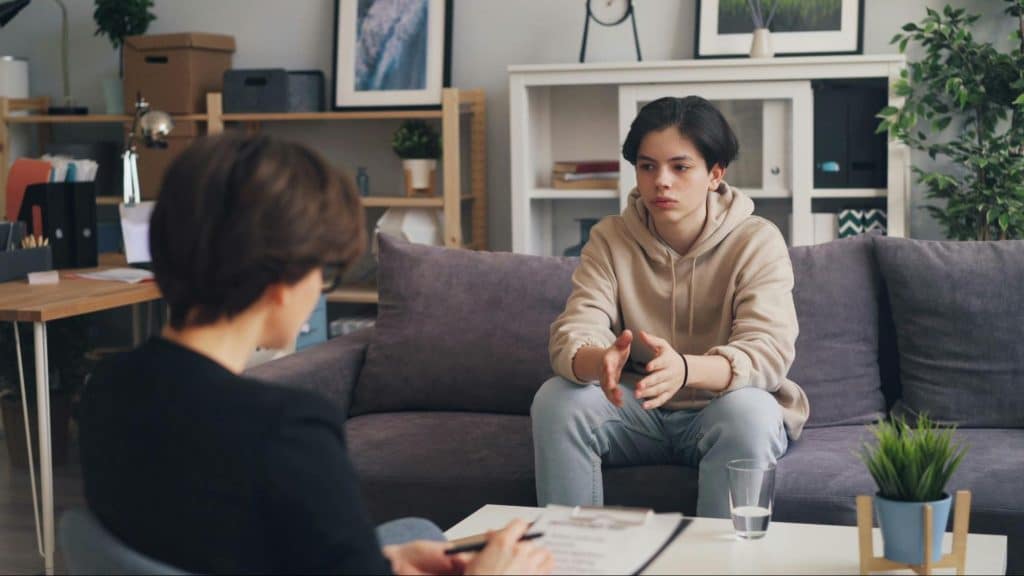 A woman talking with her kid