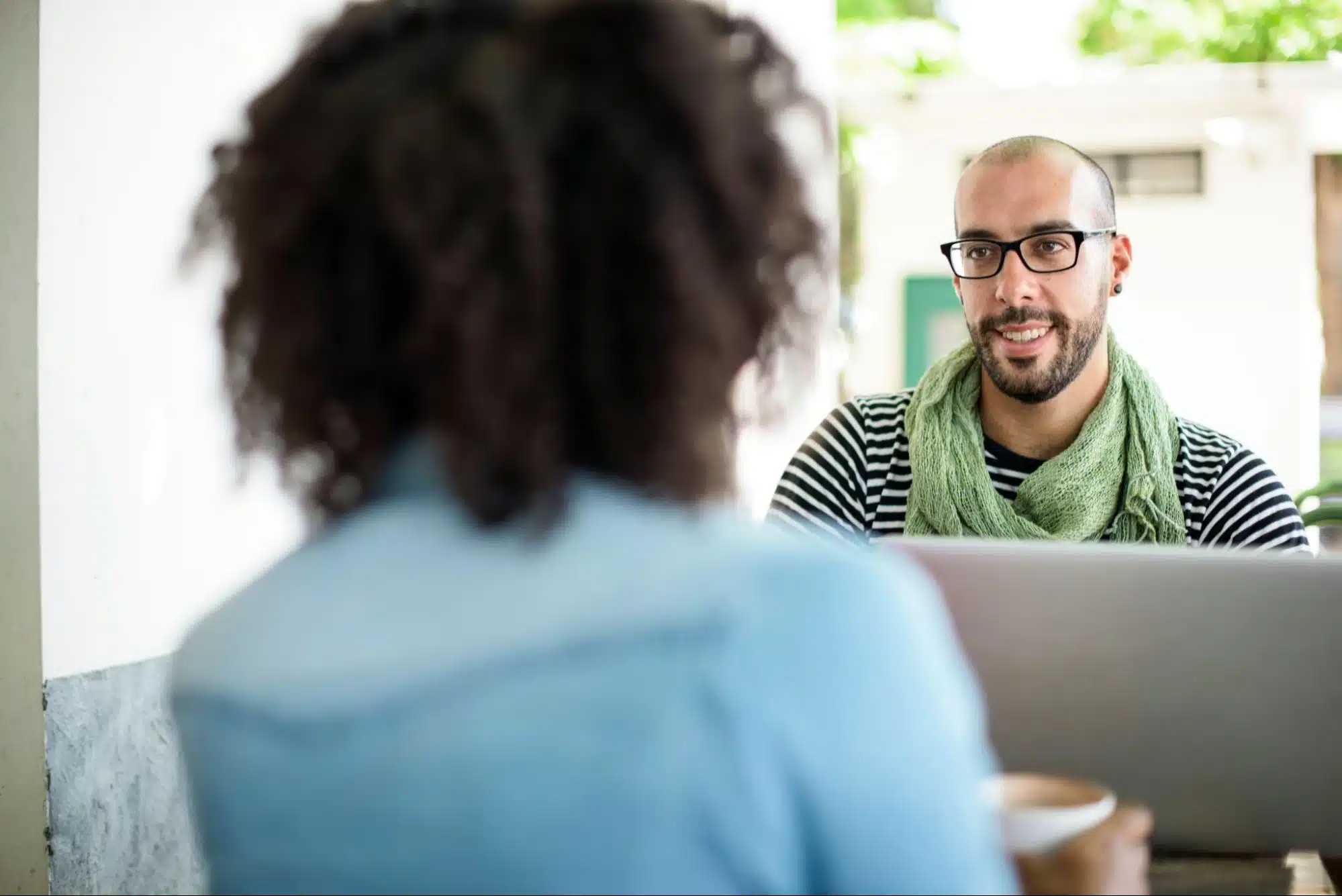 A man and woman talking