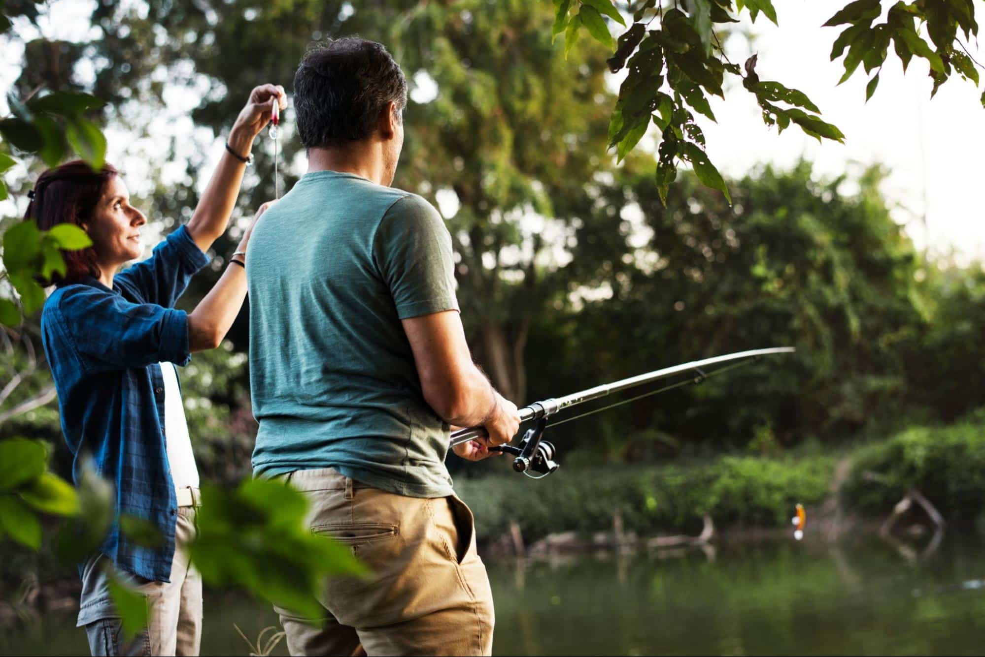 A man and woman fishing 