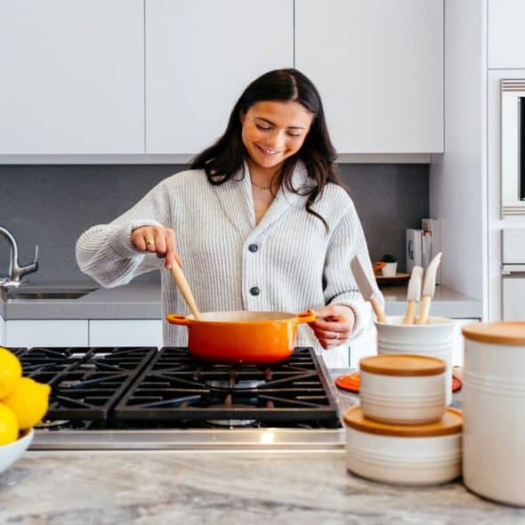 A woman cooking for her family