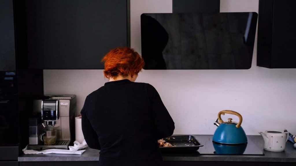 A woman cooking at home