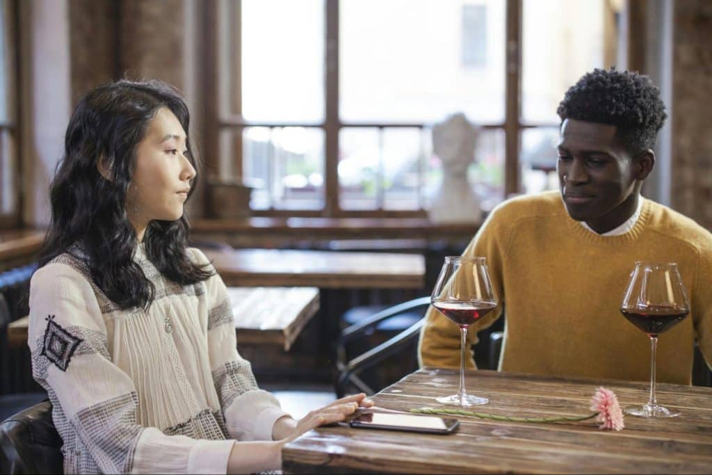 A man and woman having a date