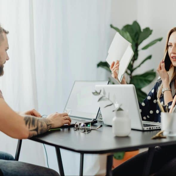 A man and woman working