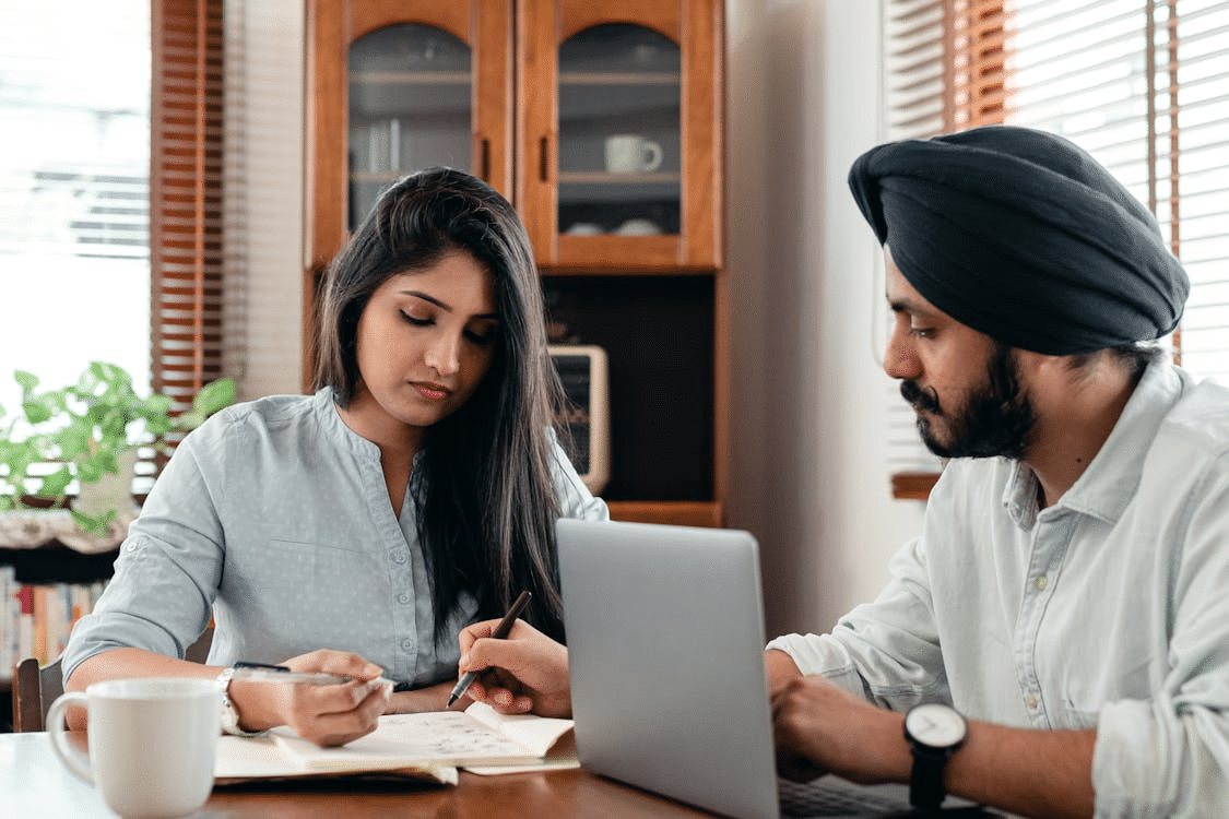 Concentrated couple discussing together