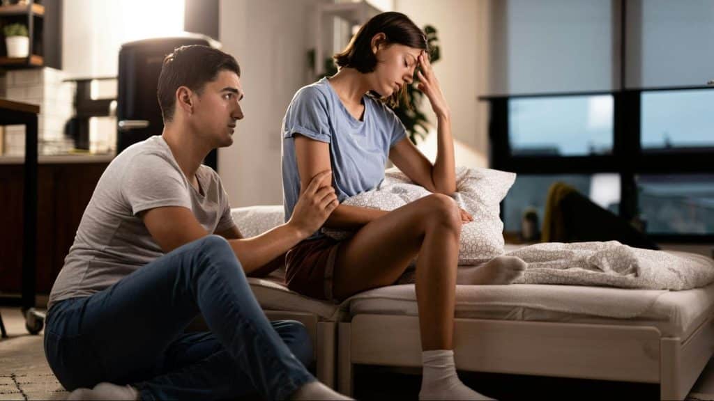 A woman getting tired of a man