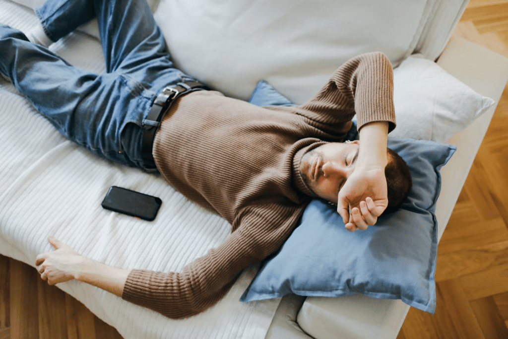 A man sleeping on the couch