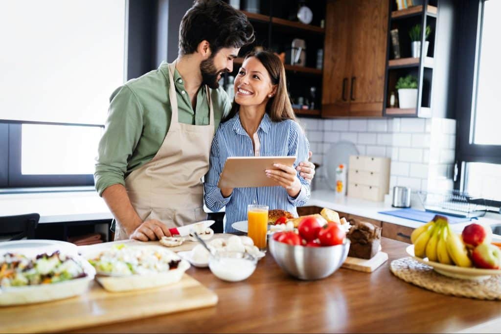 A couple at the kitchen