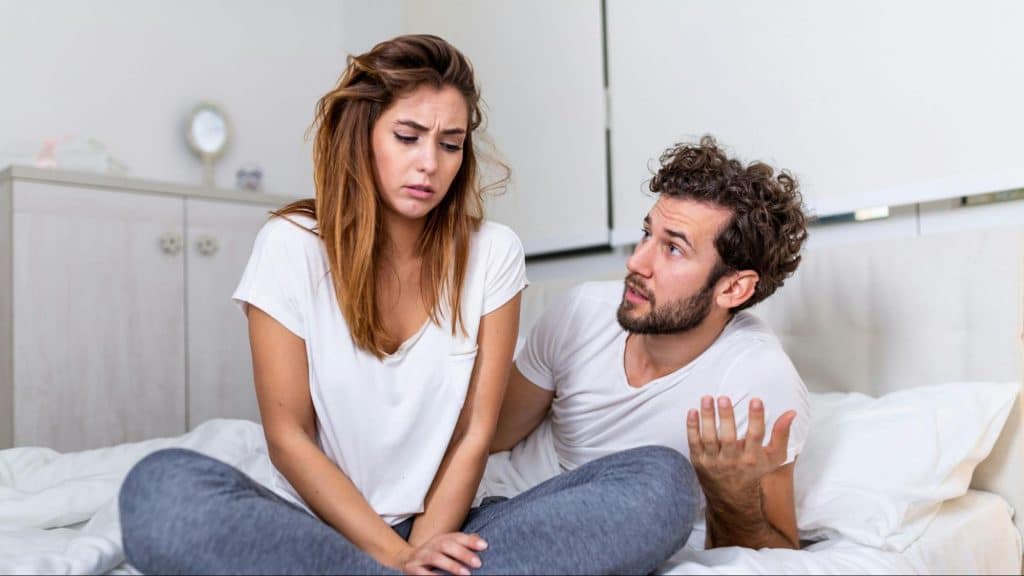 A man talking to woman