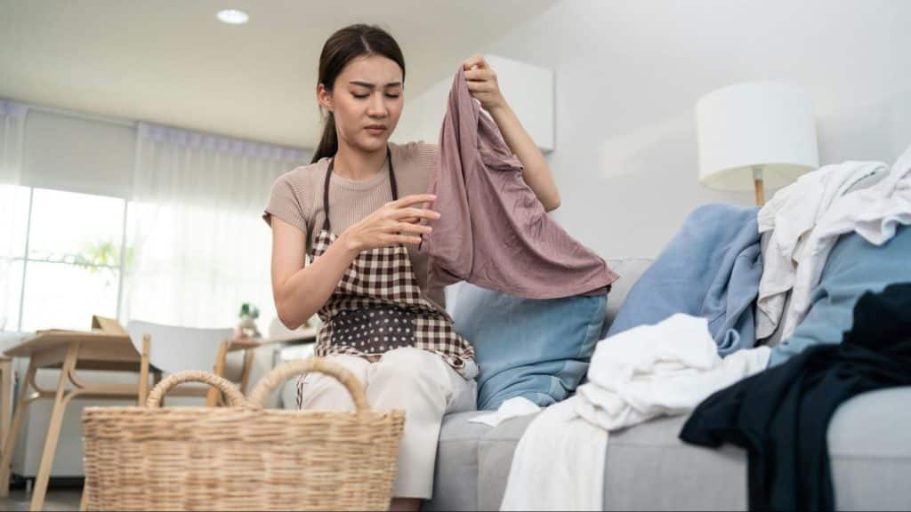 Woman getting tired doing house chores