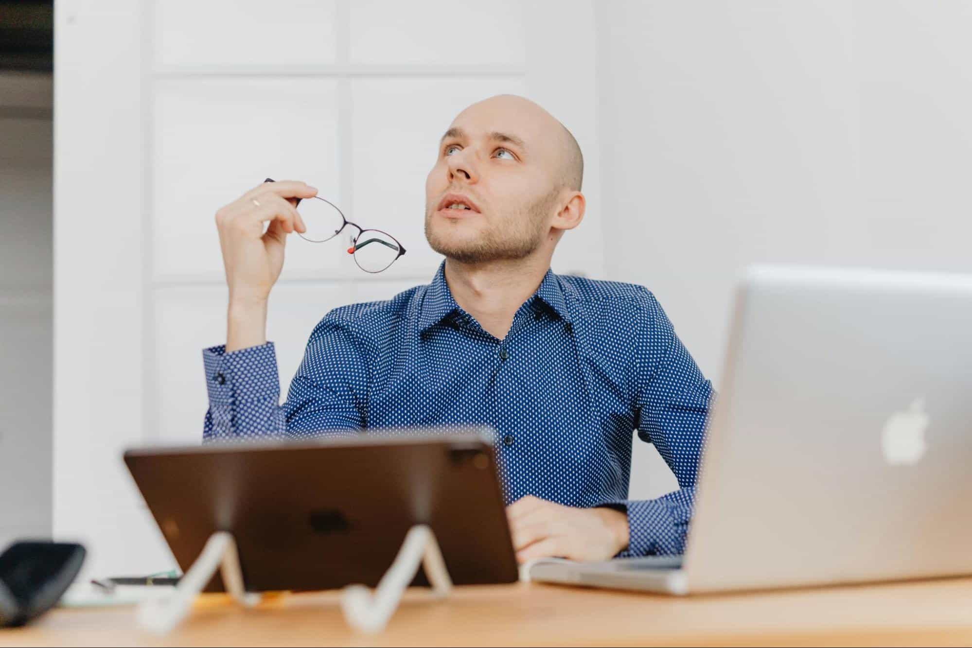 A man looking at the ceiling