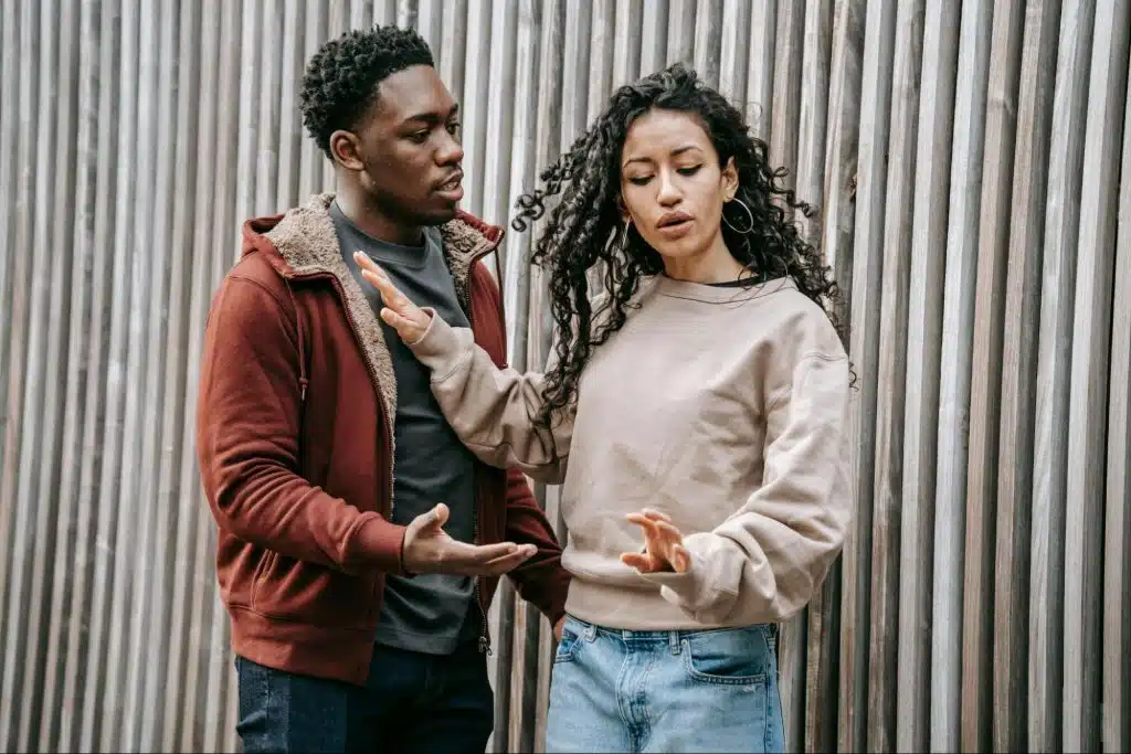 A man provoking a woman