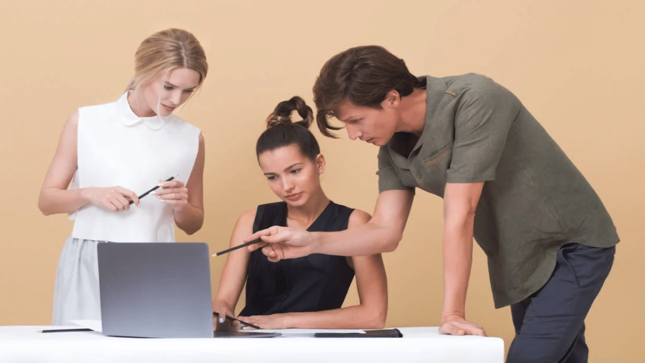 A woman receiving feedback for her work