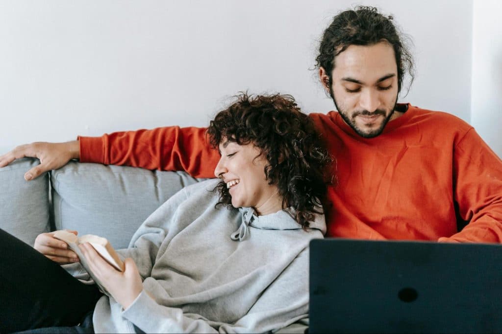 A man and woman at the couch