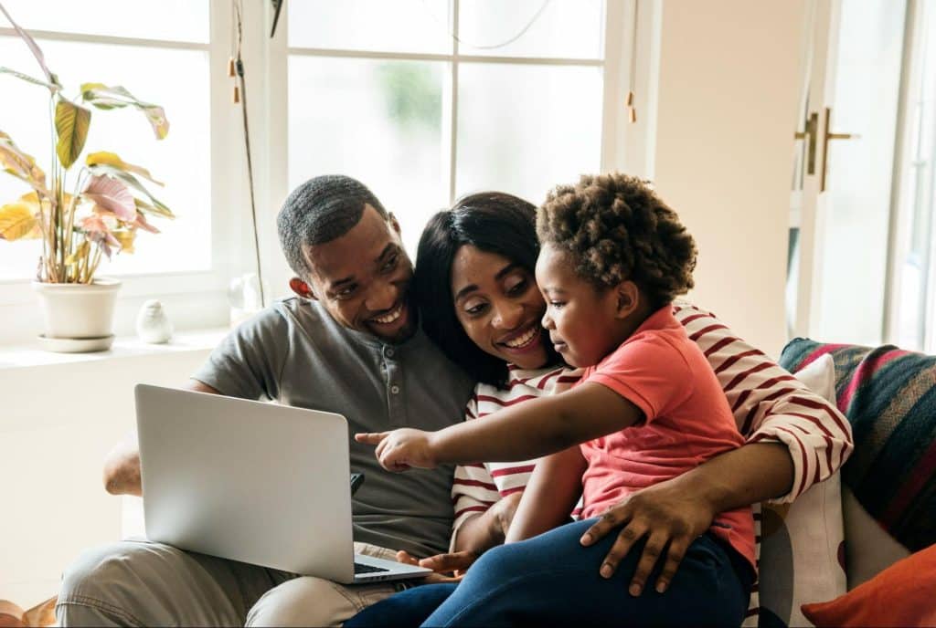 A man and woman with their daughter