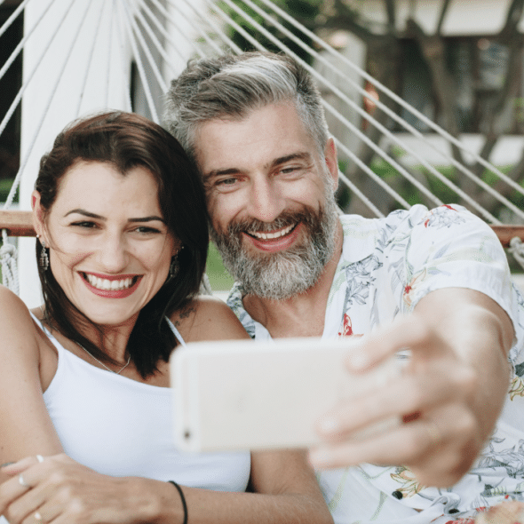 A happy couple taking a selfie