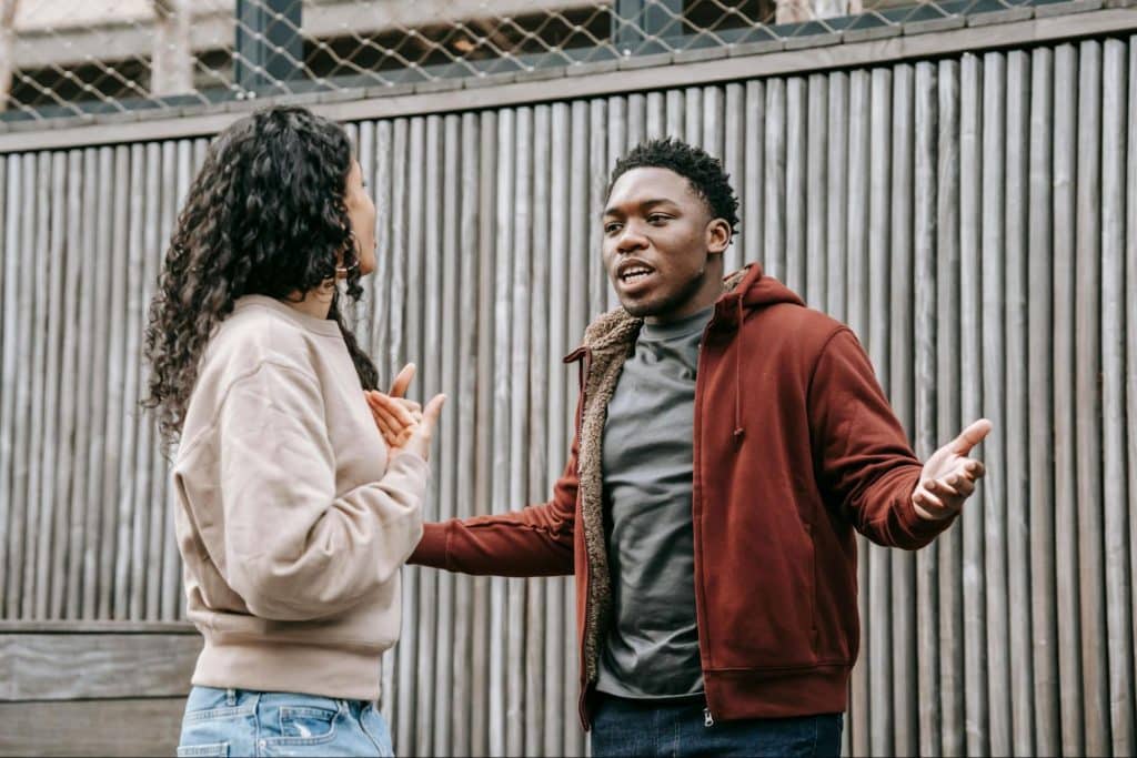A man and woman arguing