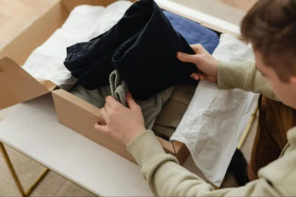 A man holding a clothes 