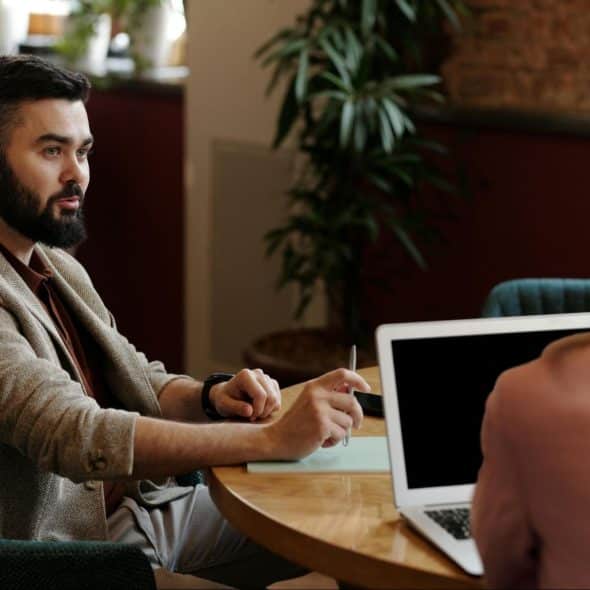 A man and woman talking