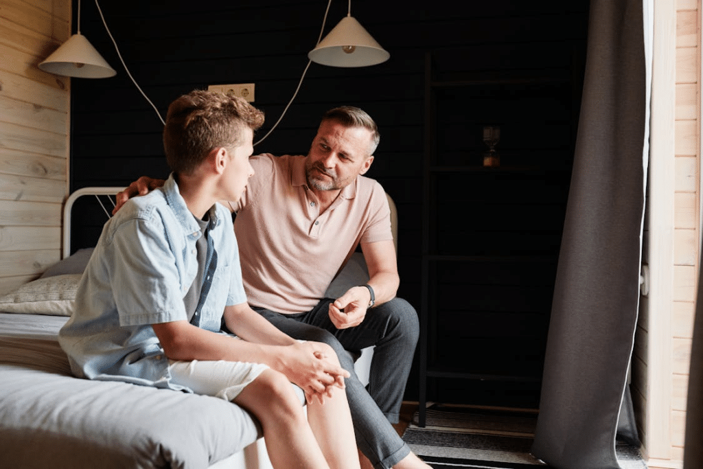 A man talking to his son