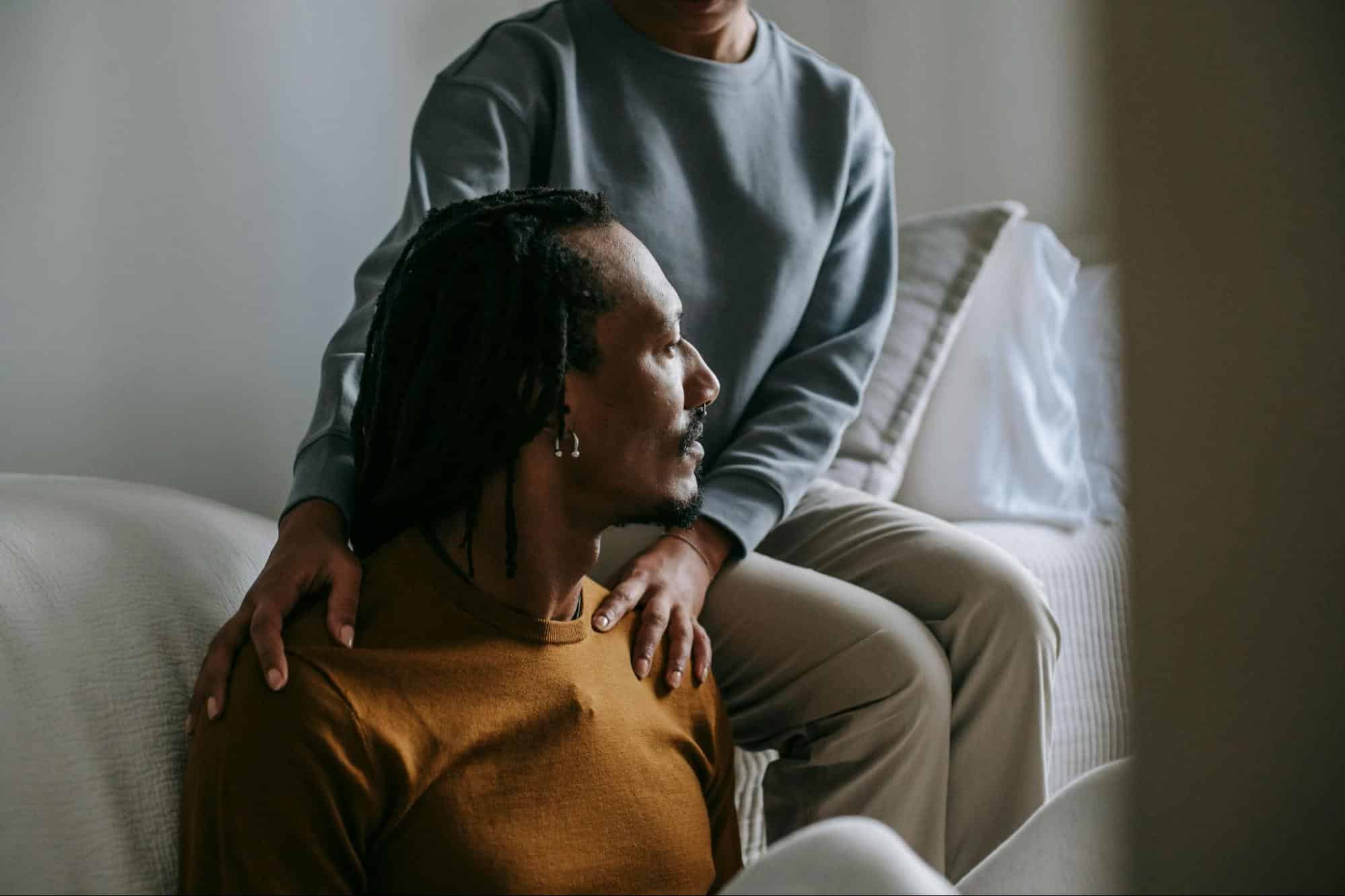 A woman hugging a man