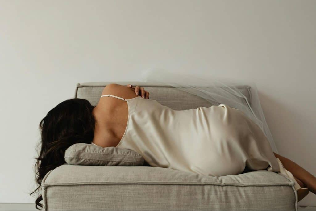 A woman lying on the couch