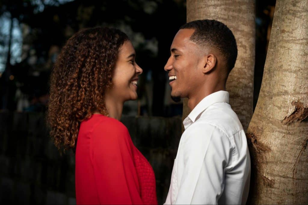 A man and woman looking at each other