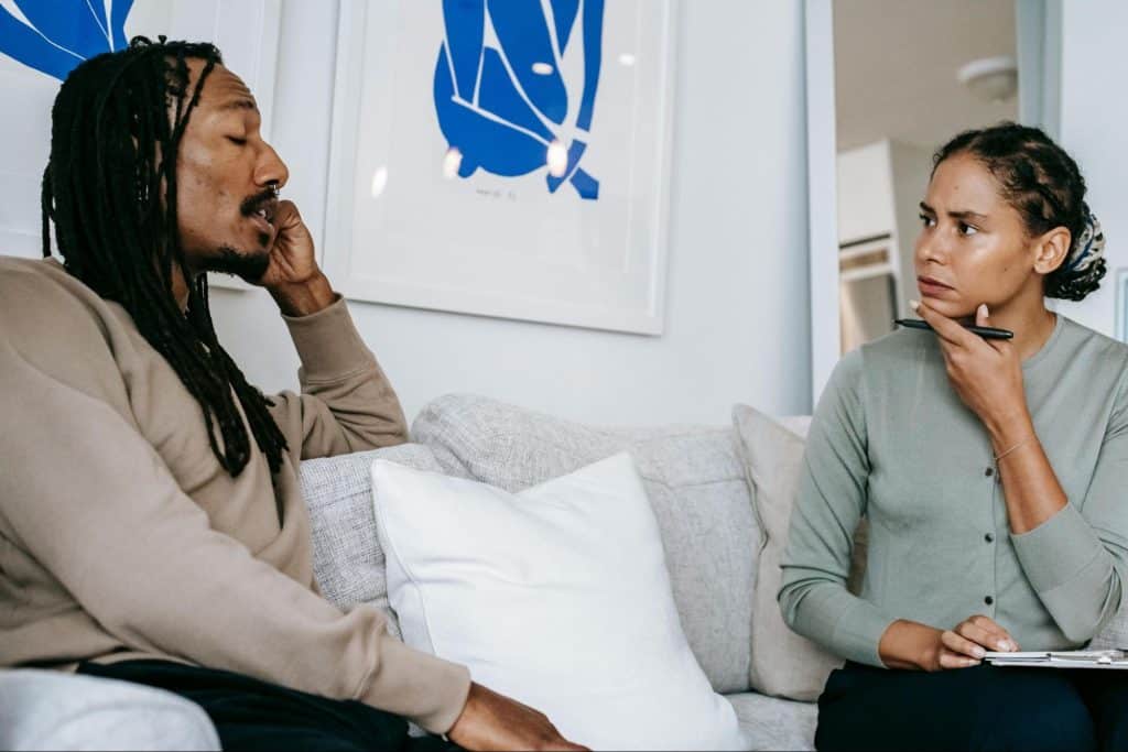 A man and woman talking