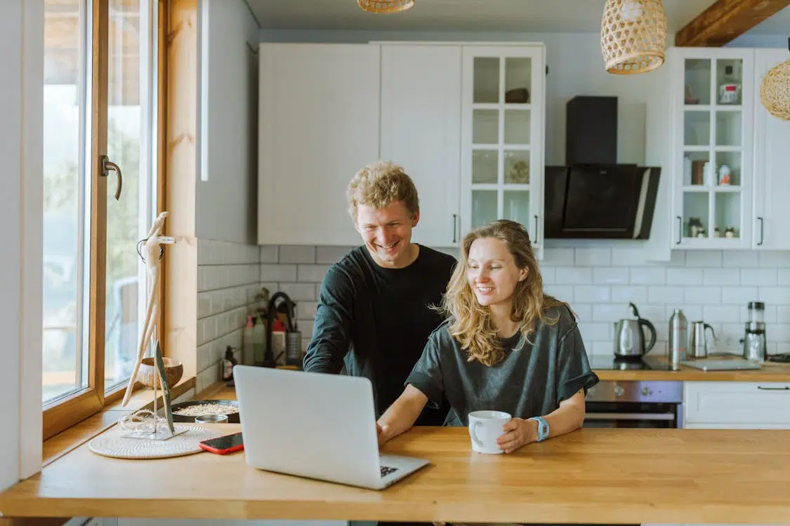 A couple using a laptop together