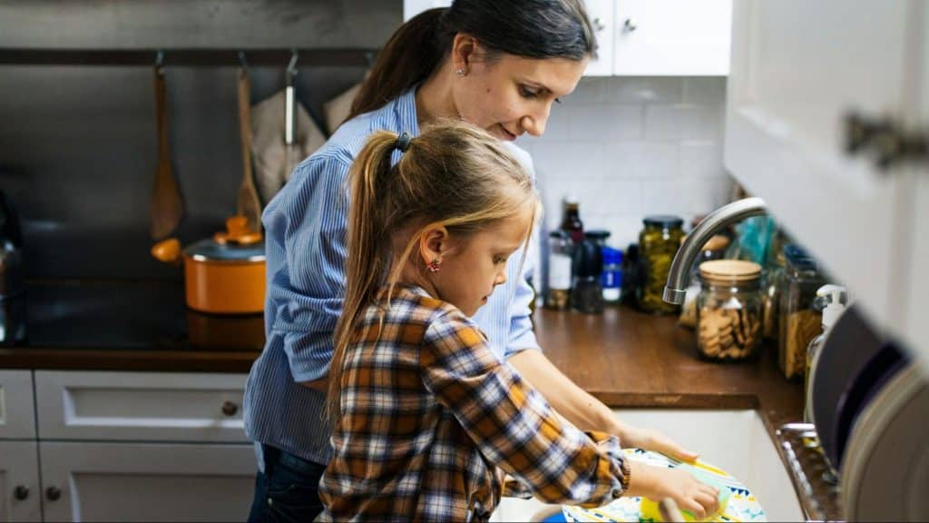 A woman taking care of her daughter