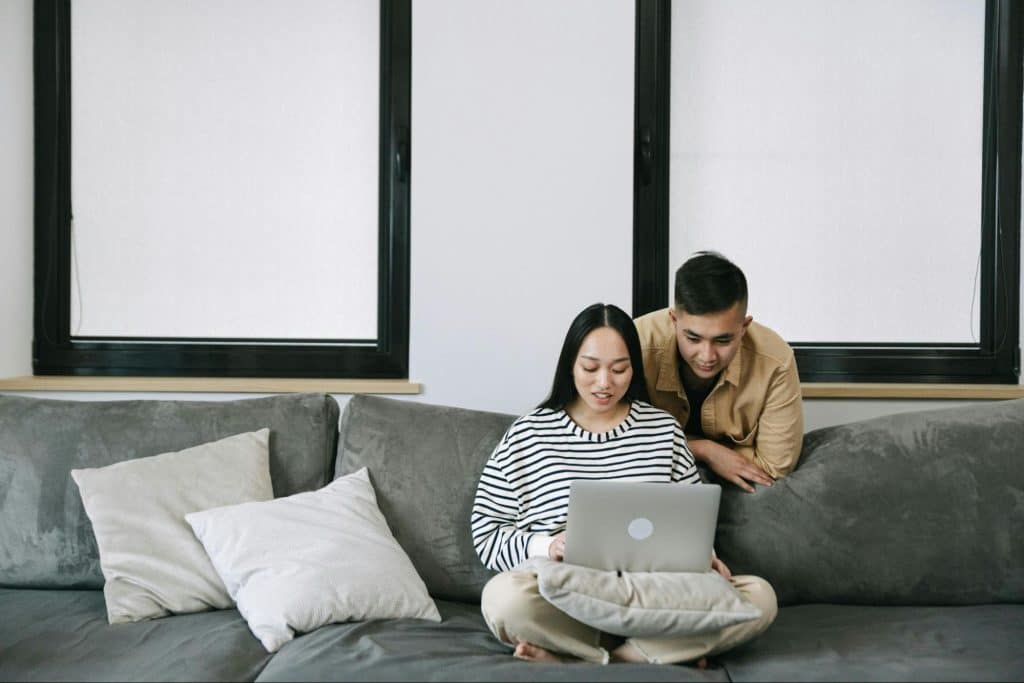 A man and woman together at the living room